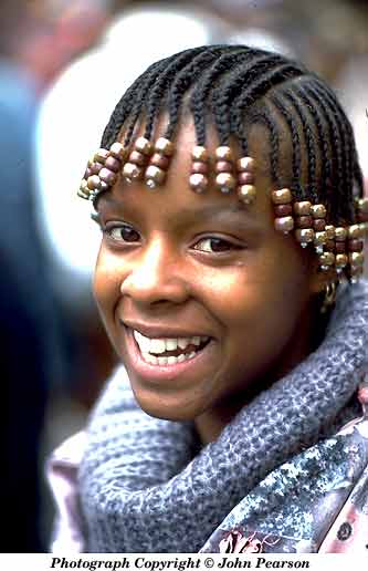 Photo of woman with corn rowed hair