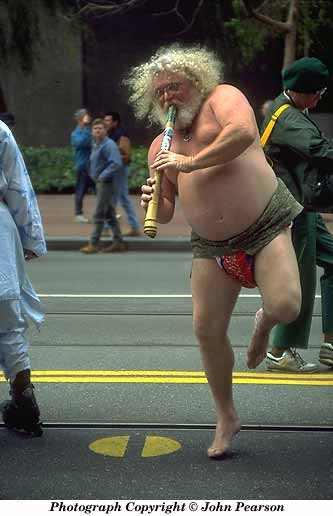 Photo of man dancing with flute